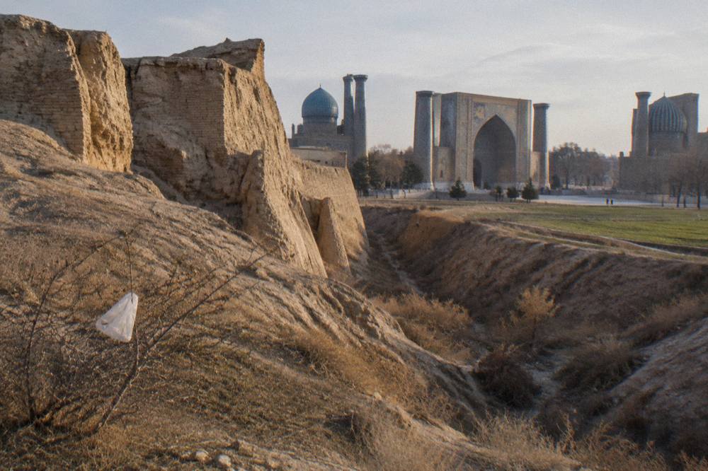 Ancient mud brick walls of the Afrasiyab settlement site outside modern Samarkand