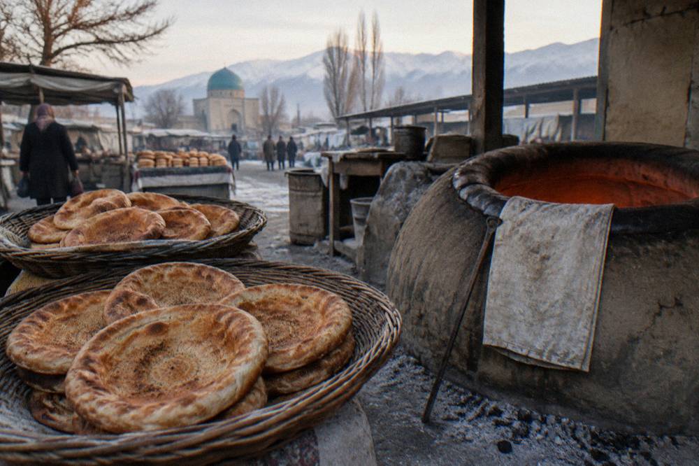 Round stamped loaves of Uzbek bread fresh from a tandoor oven at a market stall