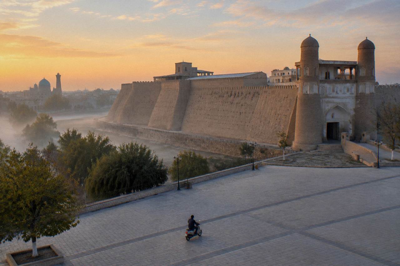 Ancient walls and minarets of a Silk Road old town under a clear sky