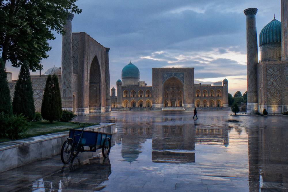 Blue tiled domes and minarets of a monument complex in Samarkand