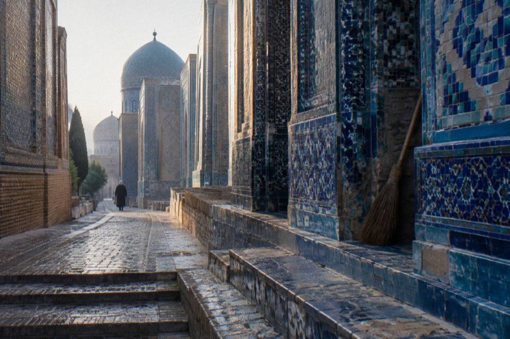 A narrow avenue of tiled mausoleum portals at the Shah-i-Zinda necropolis