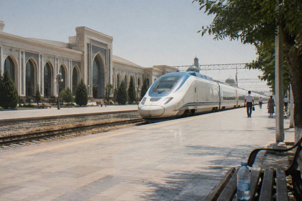 High speed train standing at a modern railway platform in Uzbekistan