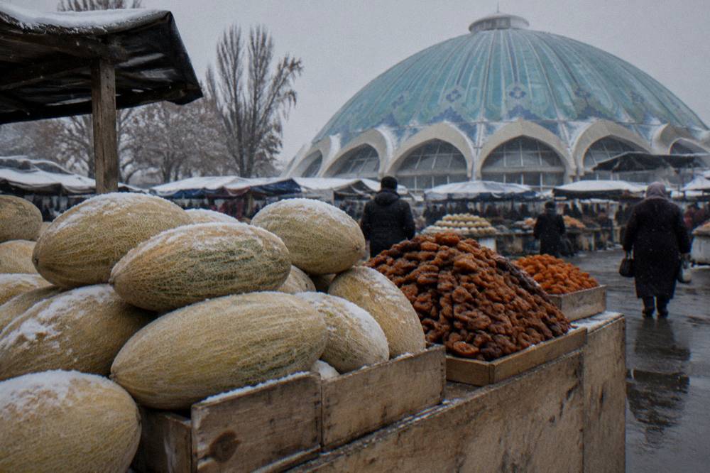 Open-air market stall with spices, dried fruit and stacked melons
